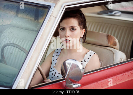 Portrait of woman in car Stock Photo