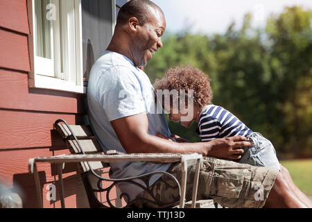 Happy family enjoying at backyard Stock Photo