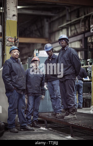Portrait of metal workers in factory Stock Photo