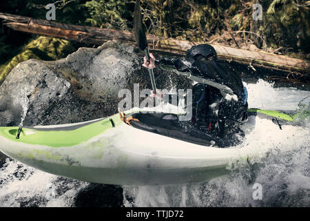 Close-up of man kayaking in river Stock Photo