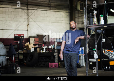 Portrait of workers standing in workshop Stock Photo