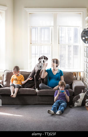 Family relaxing at home Stock Photo
