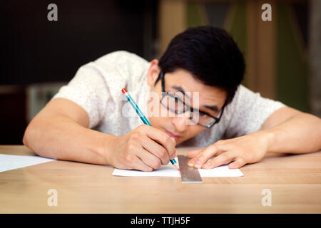 Man working in office Stock Photo
