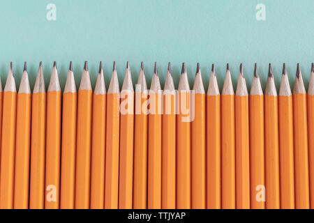 Border of orange pencils, with copy space Stock Photo