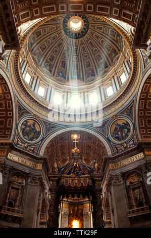 Sunlight emitting through cupola in St Peter's Basilica