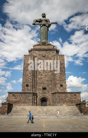 Fathers and sons by the Mother Armenia statue, Victory Park, Yerevan, Armenia Stock Photo