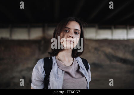 portrait of a woman under the bridge Stock Photo