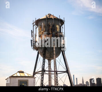 A water tank festooned with cell phone antennas in the Greenpoint neighborhood of Brooklyn on Sunday, June 9, 2019. (© Richard B. Levine) Stock Photo