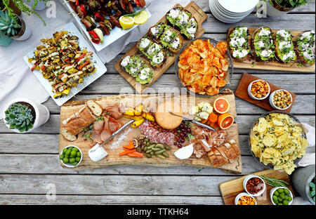 High angle view of various food served on wooden table Stock Photo