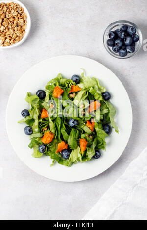 Overhead view of salad served in plate on table Stock Photo