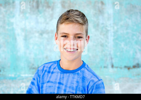 Portrait of a handsome young teen boy smiling with braces Stock Photo