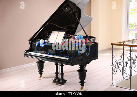 Piano with Christmas decoration Stock Photo
