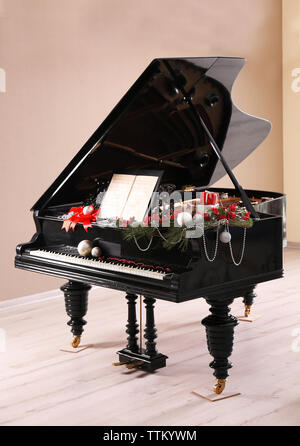 Piano with Christmas decoration Stock Photo