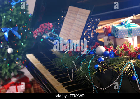 Piano with Christmas decoration Stock Photo