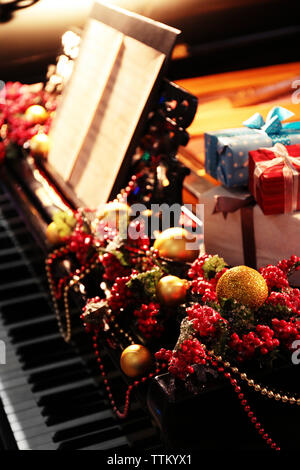 Piano with Christmas decoration Stock Photo