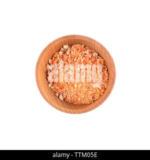 Dried chopped carrots in small wooden bowl isolated on white Stock Photo