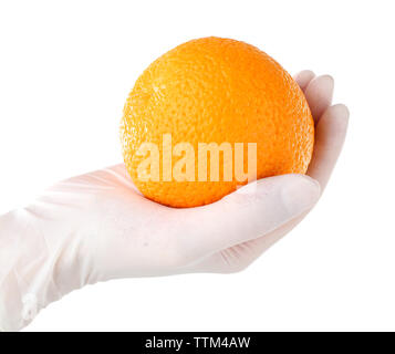 Allergy concept. Hand in glove holding orange isolated on white Stock Photo
