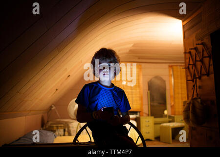 Boy in bedroom Stock Photo