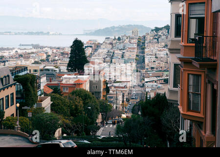 Houses in city against sky Stock Photo