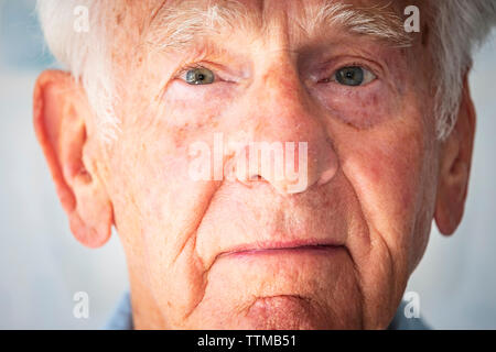 Close-up portrait of sad senior man Stock Photo