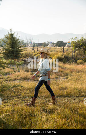 USA, Nevada, Wells, Founder Madeleine Pickens walks around the her 900 square mile property in NE Nevada where Mustang Monument, A sustainable luxury Stock Photo