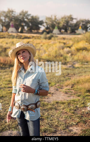 USA, Nevada, Wells, Founder Madeleine Pickens walks around the her 900 square mile property in NE Nevada where Mustang Monument, A sustainable luxury Stock Photo