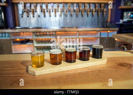 USA, Oregon, Ashland, a sample of beers brewed at the Caldera Brewery and Restaurant which includes lawnmower lager, dry hop orange, dry hop red, doup Stock Photo