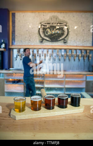 USA, Oregon, Ashland, a sample of beers brewed at the Caldera Brewery and Restaurant which includes lawnmower lager, dry hop orange, dry hop red, doup Stock Photo