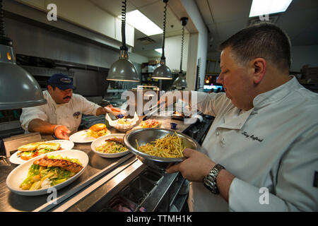 UNITED STATES - July 18, 2016: Owner / chef Tony Stafford during the lunch rush at Ford’s Fish Shack in Ashburn. They were voted by Loudoun Now reader Stock Photo