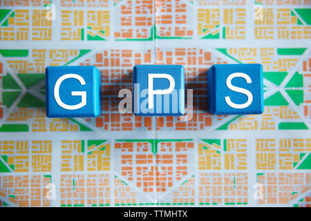 Cubes with word GPS on map background, top view Stock Photo