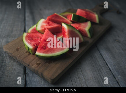 Close-up of fresh watermelon slices on cutting board Stock Photo