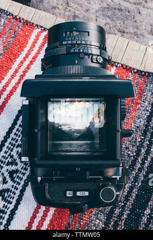 Overhead view of camera on carpet Stock Photo