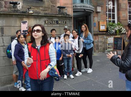Edinburgh, UK, 30th July 2018: Asian tourists on the Royal Mile. Credit: Terry Murden, Alamy Stock Photo