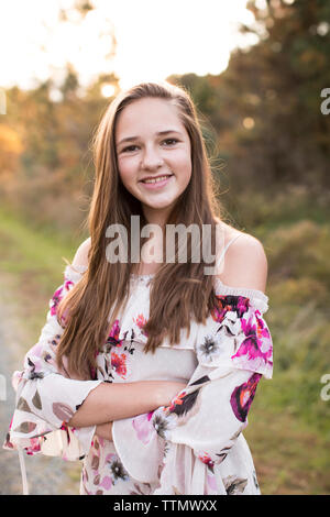 Happy, Confident 16 Year Old Camera Aware Girl on a Trail at Suns Stock Photo