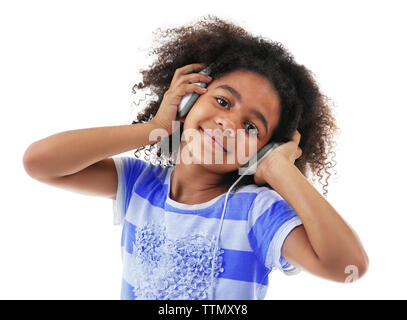 Afro-American little girl with headphones isolated on white Stock Photo