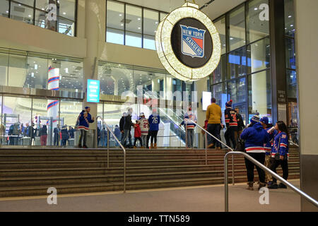 December 2017- NHL Hockey fans gather at Madison Square Garden for a NY Rangers match in New York City, New York, USA Stock Photo