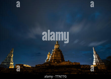 Low angle view of pagodas against sky at Phra Nakhon Si Ayutthaya Stock Photo