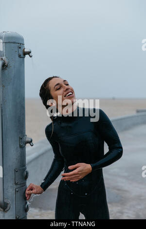 Nude woman taking shower, blurred Stock Photo - Alamy
