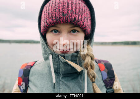 Portrait of Beautiful girl by the river
