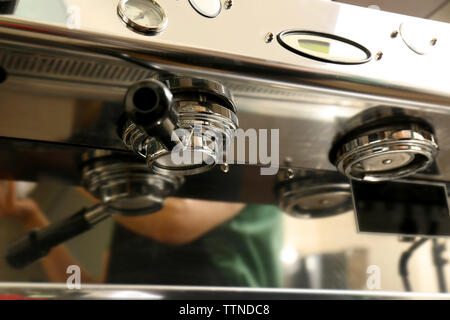 Bottomless portafilter in automatic coffee machine Stock Photo