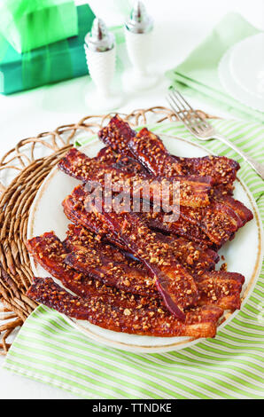High angle view of bacon served in plate on table at home Stock Photo