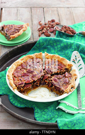 High angle view of pecan pie in tray on table at home Stock Photo