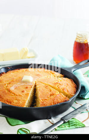 Close-up of corn bread in saucepan on table at home Stock Photo