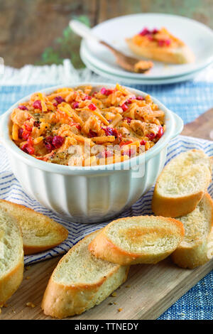 Close-up of pimento cheese and sliced breads on table at home Stock Photo