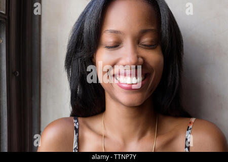 Happy woman with eyes closed Stock Photo