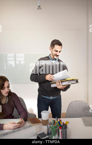 businessman checking documents during meeting in creative office Stock Photo