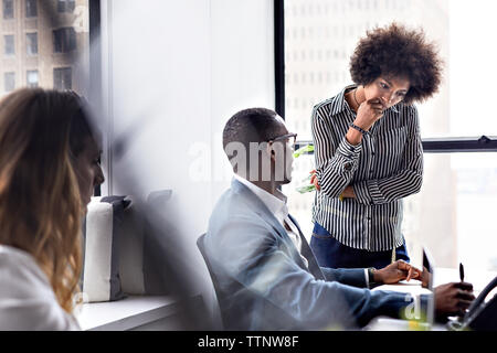 business colleagues discussing during meeting in office Stock Photo