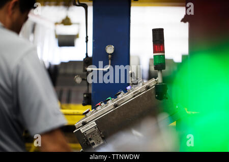 Cropped image of man working in Steel industry Factory Stock Photo