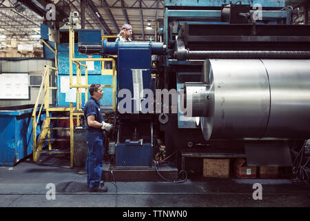 Manual workers working in steel industry Stock Photo