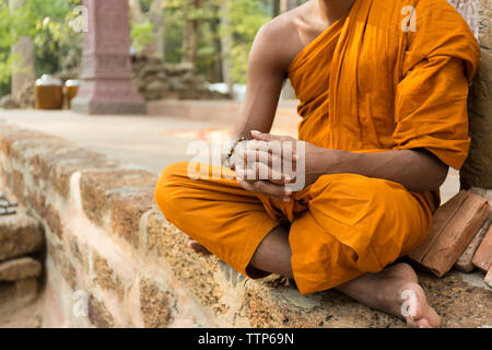 close up portrait of unrecognisable monk in Cambodia Stock Photo